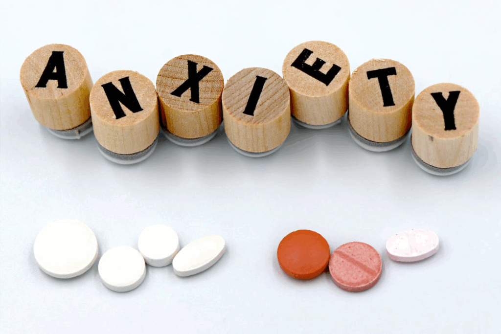 an image showing the word anxiety with some pills