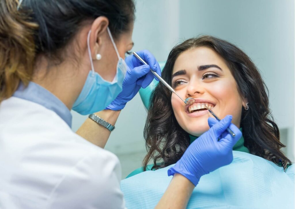 Patient receiving metal-free dental restorations consultation during a cosmetic dentistry appointment